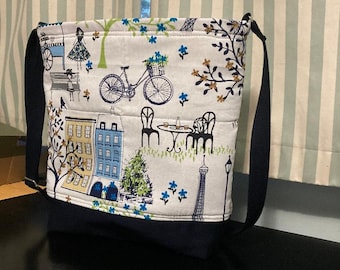 Bolso bandolera acolchado con la imagen de la Torre Eiffel.