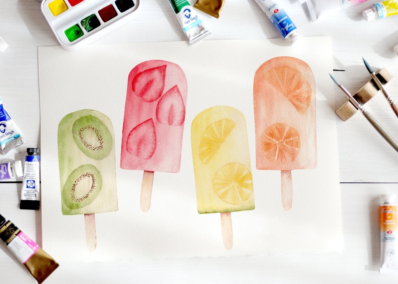May include: Watercolor painting of four popsicles on a white background. The popsicles are made with kiwi, strawberry, lemon, and orange. The painting is surrounded by paint tubes and brushes.