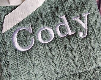 Personalized Cable Knit Baby Blanket: Embroidered Name, Pom Pom Wrap