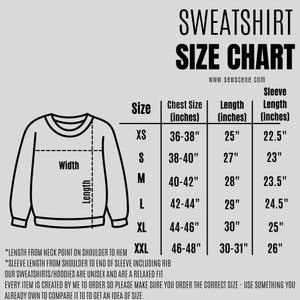 May include: A size chart for sweatshirts, showing chest size, length, and sleeve length in inches. The chart includes sizes XS, S, M, L, XL, and XXL.