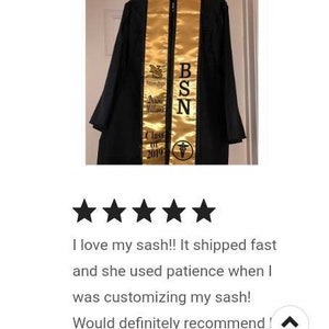 May include: A black graduation gown with a gold sash that says "BSN" and "Class of 2019".
