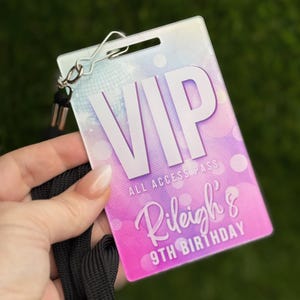 May include: A pink and purple iridescent VIP pass with the text "VIP All Access Pass Riley's 9th Birthday".