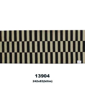 May include: A rectangular rug with a repeating pattern of alternating black and beige vertical stripes. The rug measures 242 cm x 83 cm. The text "13904" and "242x83(kilim)" are at the bottom.