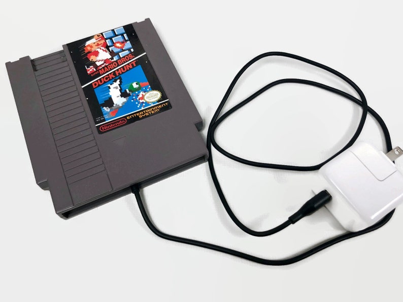 Super Mario Bros Nintendo Game Cartridge Wireless Phone image 0