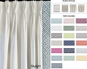 Pair of fully lined pinch pleat or euro pleat curtains/drapes in white 7 oz. Cotton duck with capri border tape on leading edge - 2 panels