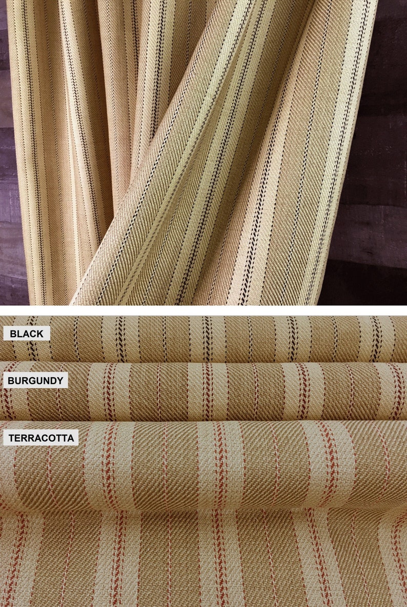 May include: Close-up of three fabric samples with a striped pattern. The top sample is black and white, the middle sample is burgundy and white, and the bottom sample is terracotta and white.