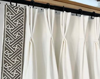 Pair of fully lined pinch pleat or euro pleat curtains/drapes in white 7 oz. Cotton duck with taupe border tape on leading edge - 2 panels