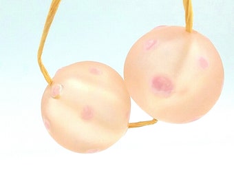 Hand made hollow glass beads etched.