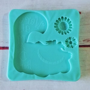 Stampo in silicone Stregatto con scritta "We're all mad here" per creazioni in resina e fimo