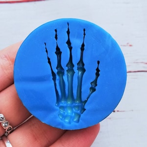 Stampo in silicone mano teschio ossa per creazioni in resina e fimo