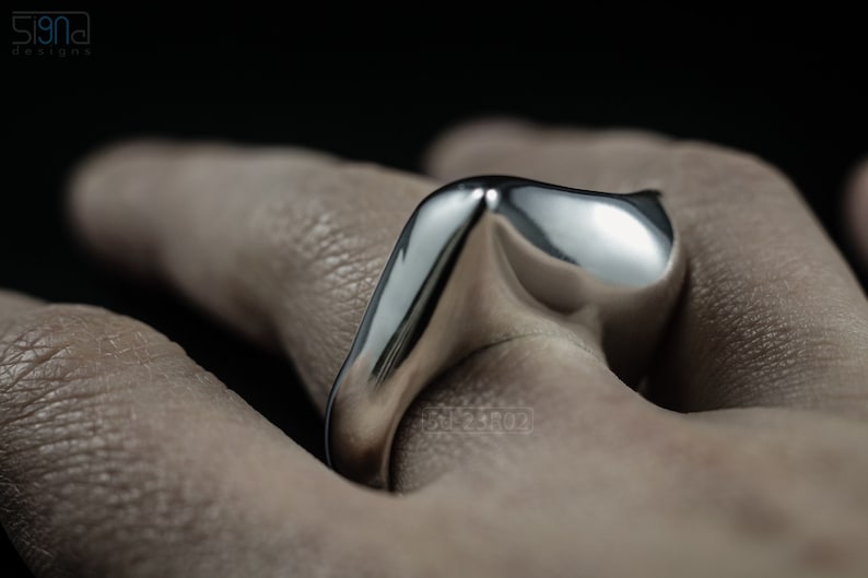 Contemporary Massive Modern Ring in Sterling Silver with Curves and High Shine, Cushion Like Shape. On Finger.