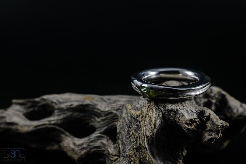 Bold Irregular Unisex Ring in Sterling Silver with Green Natural Peridot Nugget, Thick Forged Chunky Jewelry, Hammered Unique Ring. On Dry Cactus Wood.