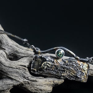 Mixed Metal Organic Necklace with Greenish Blue Sapphire and Topaz, Dark Texture, Statement Edgy Asymmetrical Chain, Silver and Gold Accents. On Dried Cactus Woos.