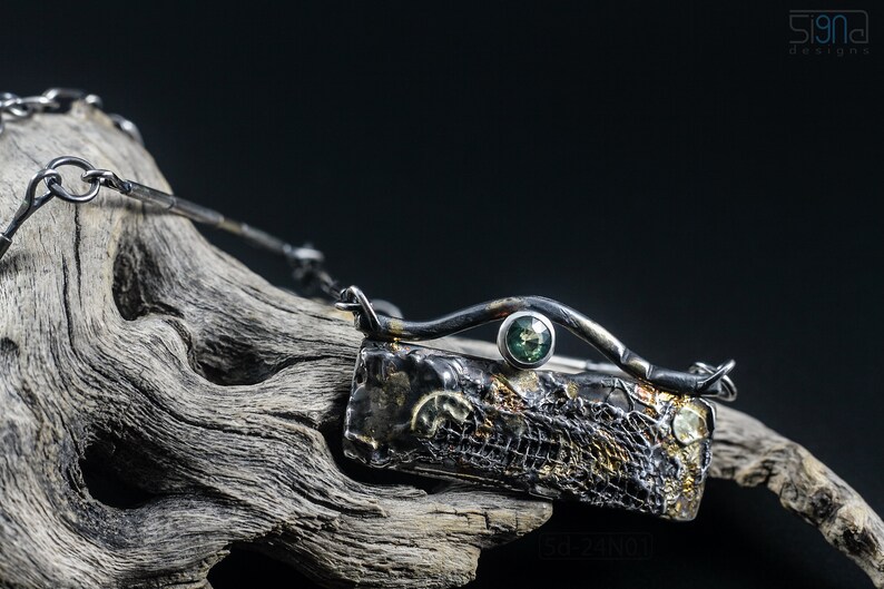 Mixed Metal Organic Necklace with Greenish Blue Sapphire and Topaz, Dark Texture, Statement Edgy Asymmetrical Chain, Silver and Gold Accents. On Dried Cactus Woos.