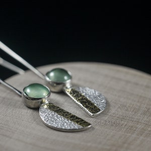 Reticulated Silver Earrings with 24k Keum-Boo Gold Foil and Prehnite Cabochons, Organic and Contemporary. Reticulated Half Oval Shape with a Stripe of Gold Leaf and Long Ear Wires. On wooden box
