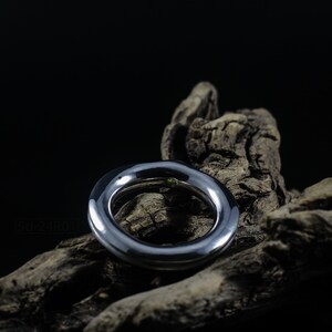 Bold Irregular Unisex Ring in Sterling Silver with Green Natural Peridot Nugget, Thick Forged Chunky Jewelry, Hammered Unique Ring. On Dry Cactus Wood.