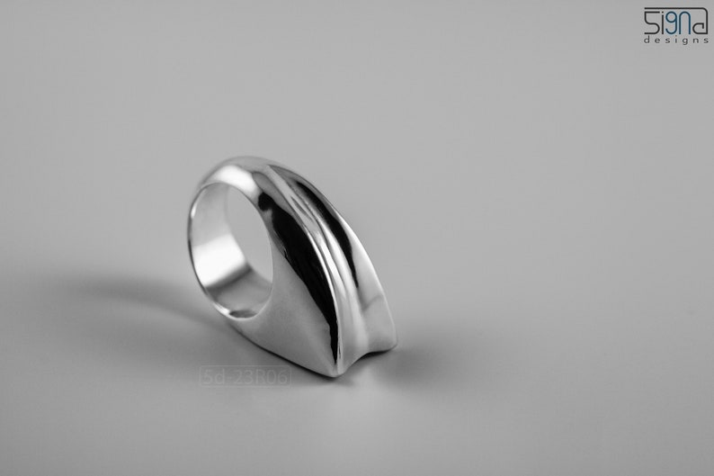 Geometric Ring, Contemporary Design, Massive, Bold and Unisex, with High Shine Finish. On white background.