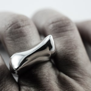Contemporary Massive Modern Ring in Sterling Silver with Curves and High Shine, Cushion Like Shape. On Finger.