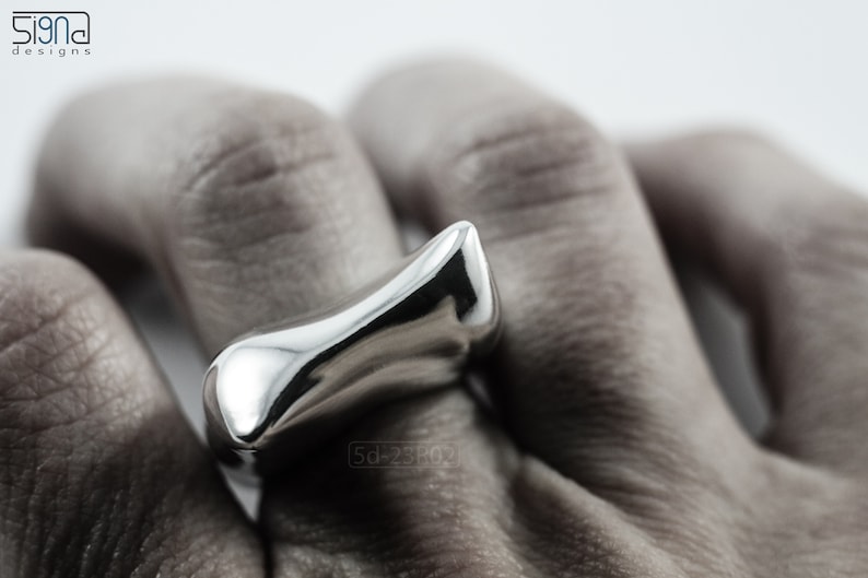 Contemporary Massive Modern Ring in Sterling Silver with Curves and High Shine, Cushion Like Shape. On Finger.