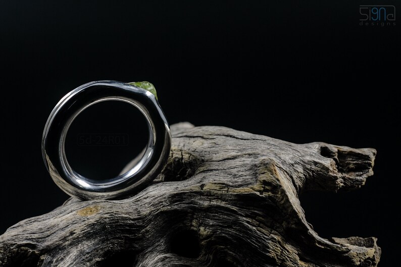 Bold Irregular Unisex Ring in Sterling Silver with Green Natural Peridot Nugget, Thick Forged Chunky Jewelry, Hammered Unique Ring. On Dry Cactus Wood.
