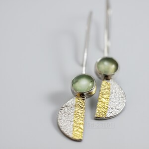Reticulated Silver Earrings with 24k Keum-Boo Gold Foil and Prehnite Cabochons, Organic and Contemporary. Reticulated Half Oval Shape with a Stripe of Gold Leaf and Long Ear Wires. on white background.