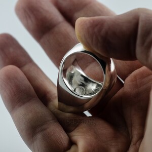 Geometric Ring, Contemporary Design, Massive, Bold and Unisex, with High Shine Finish. Inside detail. In hand, white background.