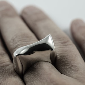 Contemporary Massive Modern Ring in Sterling Silver with Curves and High Shine, Cushion Like Shape. On Finger.