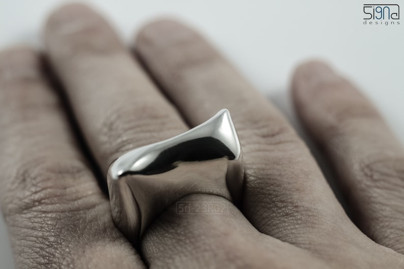 Contemporary Massive Modern Ring in Sterling Silver with Curves and High Shine, Cushion Like Shape. On Finger.