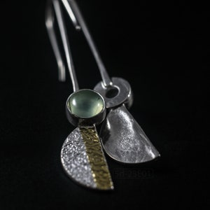 Reticulated Silver Earrings with 24k Keum-Boo Gold Foil and Prehnite Cabochons, Organic and Contemporary. Reticulated Half Oval Shape with a Stripe of Gold Leaf and Long Ear Wires. Black background. Top and back view.