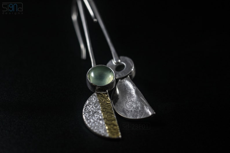 Reticulated Silver Earrings with 24k Keum-Boo Gold Foil and Prehnite Cabochons, Organic and Contemporary. Reticulated Half Oval Shape with a Stripe of Gold Leaf and Long Ear Wires. Black background. Top and back view.