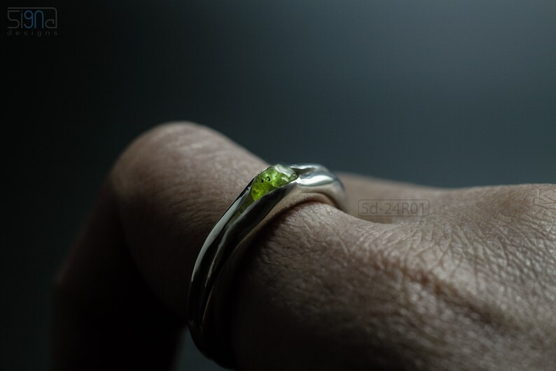 Bold Irregular Unisex Ring in Sterling Silver with Green Natural Peridot Nugget, Thick Forged Chunky Jewelry, Hammered Unique Ring. On Finger.