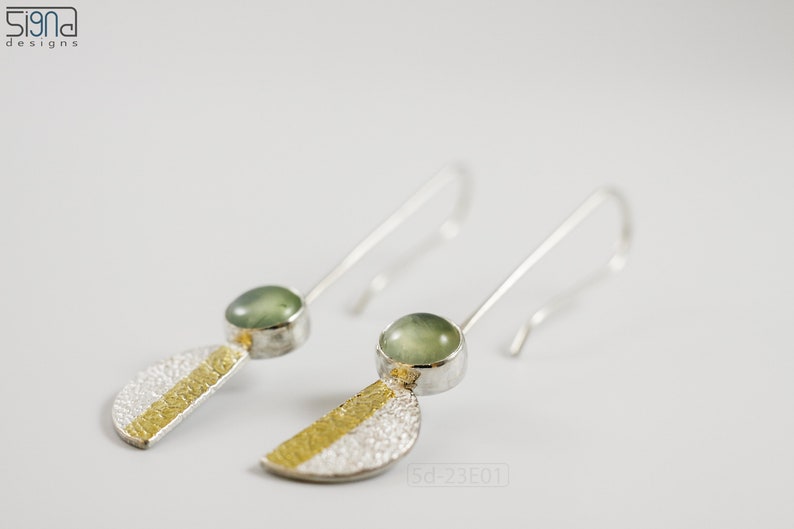 Reticulated Silver Earrings with 24k Keum-Boo Gold Foil and Prehnite Cabochons, Organic and Contemporary. Reticulated Half Oval Shape with a Stripe of Gold Leaf and Long Ear Wires. On white background.