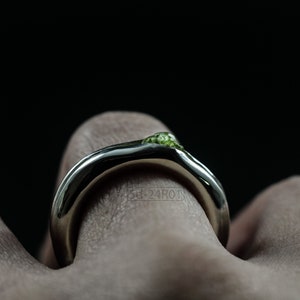 Bold Irregular Unisex Ring in Sterling Silver with Green Natural Peridot Nugget, Thick Forged Chunky Jewelry, Hammered Unique Ring. On Finger.