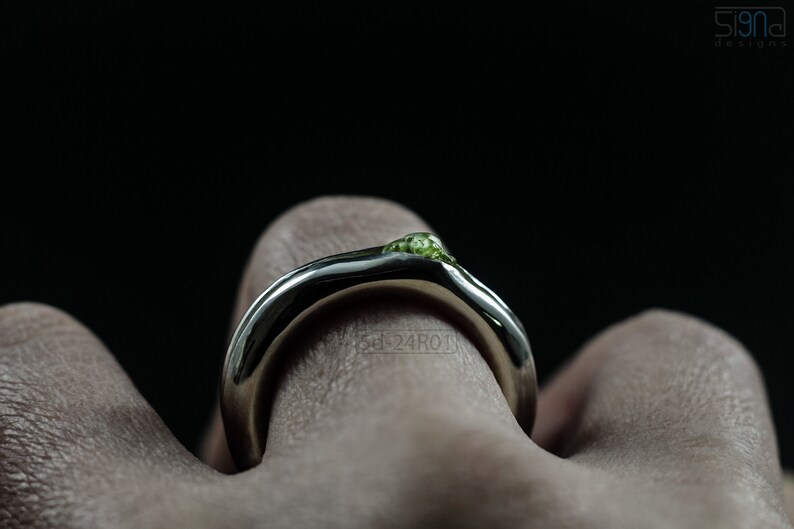 Bold Irregular Unisex Ring in Sterling Silver with Green Natural Peridot Nugget, Thick Forged Chunky Jewelry, Hammered Unique Ring. On Finger.