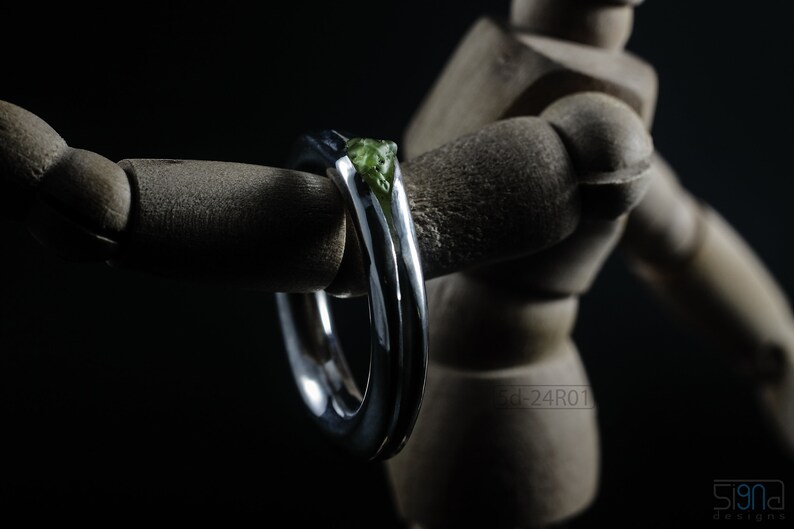 Bold Irregular Unisex Ring in Sterling Silver with Green Natural Peridot Nugget, Thick Forged Chunky Jewelry, Hammered Unique Ring. On Wooden Art Miniature Mannequin.