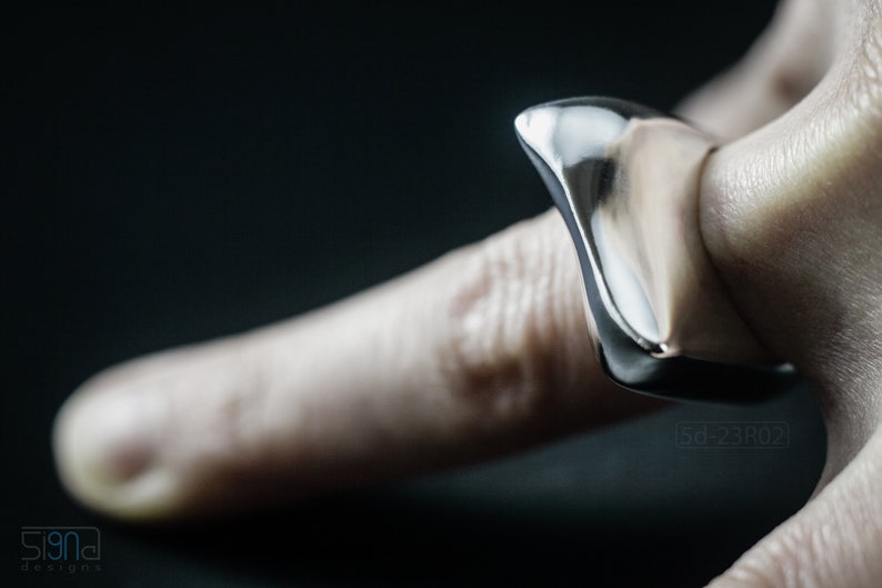 Contemporary Massive Modern Ring in Sterling Silver with Curves and High Shine, Cushion Like Shape. On Finger.