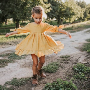 Handmade linen girls dress with tie sleeves and ruffle bottom many colors