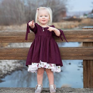 Burgundy dress with floral underskirt. RTS