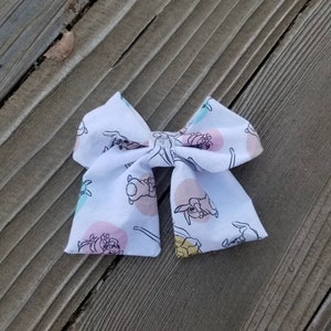 matching bow tie and hair bow