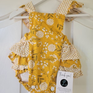 Yellow floral romper with bow