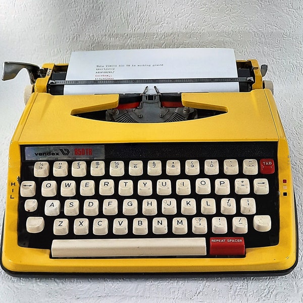 Vintage 1970s yellow Dutch  Vendex 850 TR (Brother) Typewriter in very good condition.   T477