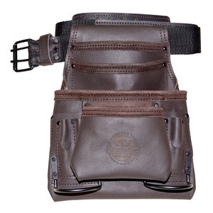 May include: A brown leather tool belt with multiple pockets and a black nylon belt. The belt has a metal buckle and is designed for carrying tools. The tool belt has a logo that says "HOME FOR TOOLS".