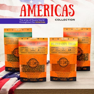 May include: Four orange and white spice packets with the text "Spice Cartel" and "Americas Collection" on the front. Each packet features a different flavor profile: Gaucho Chimichurri, Deep South Creole, Mexico City Tacos, and Montreal Steak. The packets are arranged on a wooden surface with an American flag in the background.