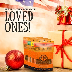 May include: Four spice blends in small pouches with red, white, and blue stars on the front. The pouches are labeled "Deep South Creole" and "Spice Level" with a red, white, and blue American flag in the background. The pouches are packaged in a brown box with a red ribbon.