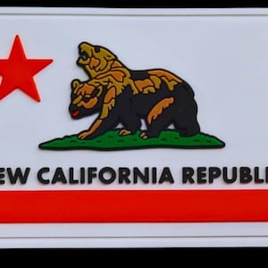 May include: A rectangular white patch featuring a red star on the left and a two-headed bear graphic in black and brown standing on a green patch of grass. The text NEW CALIFORNIA REPUBLIC is in black letters above a horizontal red stripe.