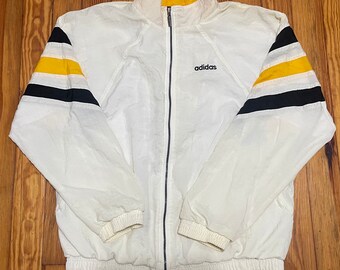 yellow adidas jacket with black stripes