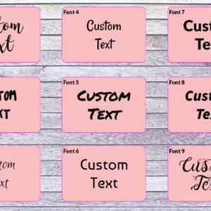 May include: A grid of nine pink rectangular labels, each displaying the words Custom Text in a unique typeface. The labels are numbered Font 1 through Font 9, showcasing various black lettering styles ranging from cursive scripts to bold sans-serif fonts.