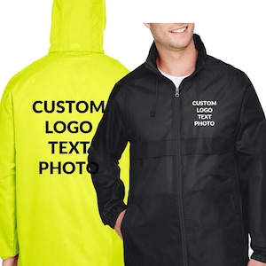 May include: Two jackets, one neon yellow and one black, are displayed. The yellow jacket has a hood and the text "CUSTOM LOGO TEXT PHOTO" printed on the back. The black jacket has the same text on the front.