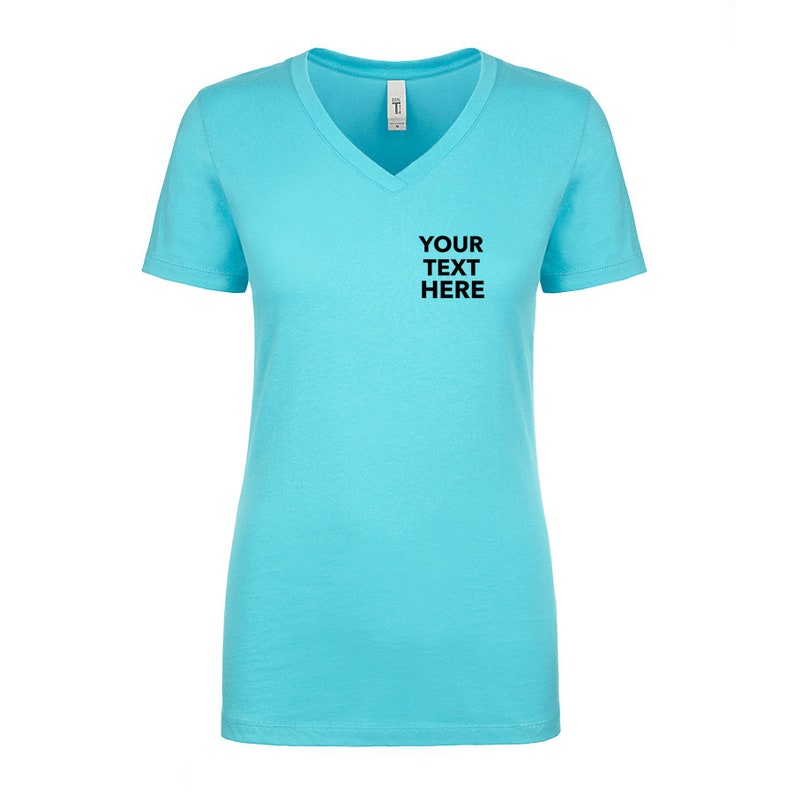 May include: A bright turquoise short-sleeve t-shirt with a V-neckline. The front of the shirt features the black text "YOUR TEXT HERE" printed on the upper left chest area. The garment has a standard fit with a straight hemline and a white neck label.