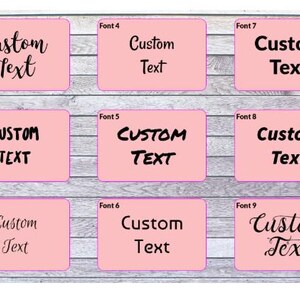May include: A grid of nine rectangular pink labels, each featuring the words Custom Text in a unique black typeface. The labels are numbered Font 1 through Font 9, showcasing various lettering styles ranging from cursive scripts to bold sans-serif fonts.